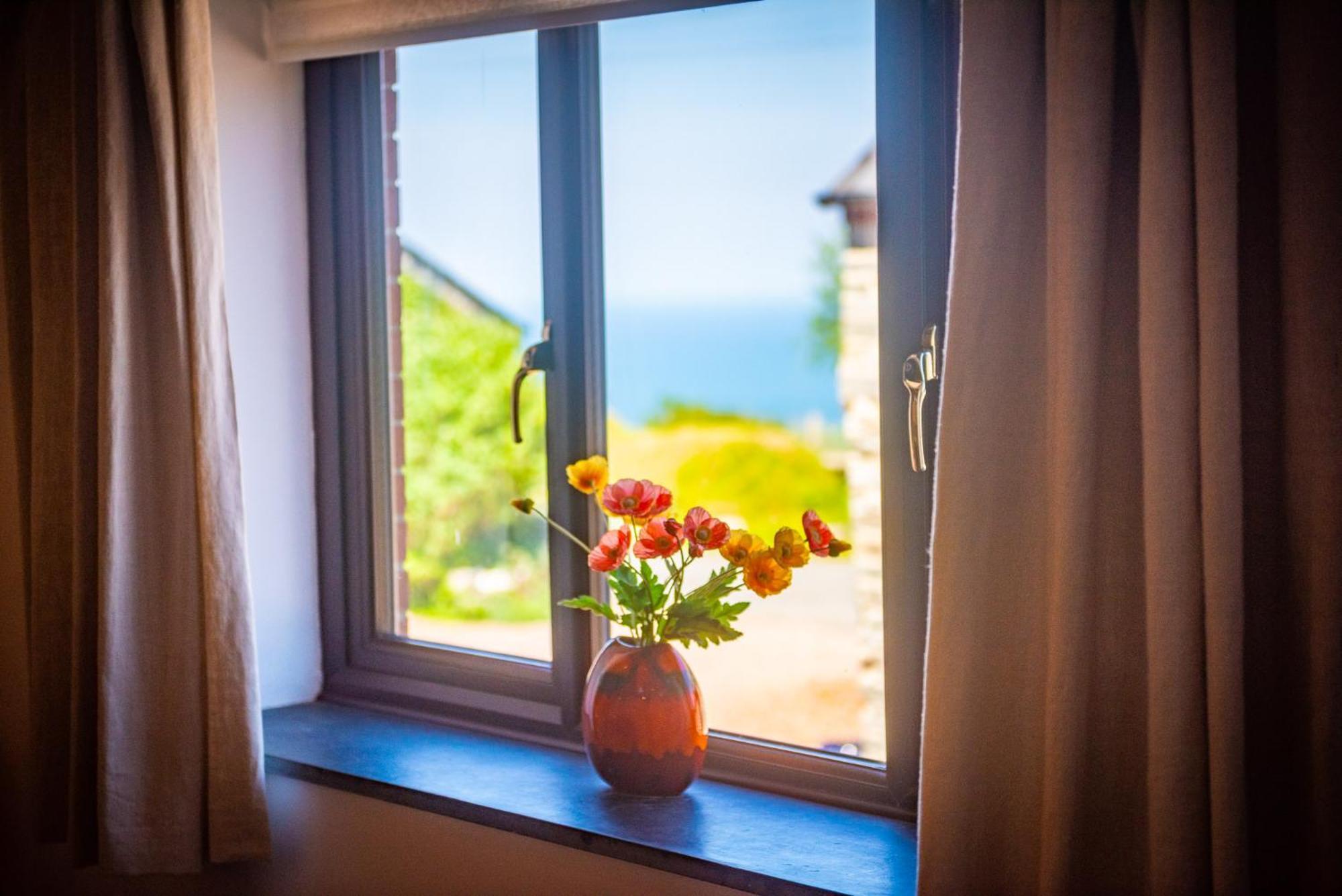 Polrunny Farm Sloe Cottage With A Sea View 博斯卡斯尔 外观 照片